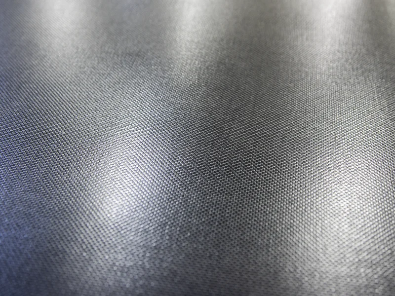 Integra Aegis fabric texture in Charcoal — 18-oz woven vinyl with UV stabilization